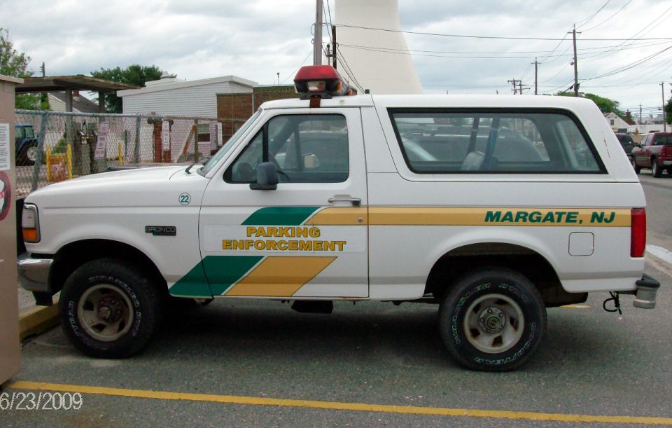 White 1994 Ford Bronco with "PARKING ENFORCEMENT" livery