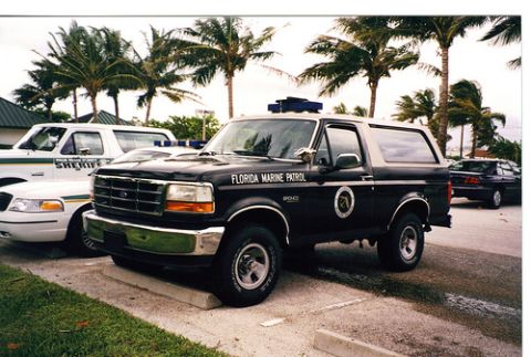 1994 Ford Bronco - A black 1994 Ford Bronco, marked as Florida Marine Patrol, is parked next to a Sheriff's vehicle.