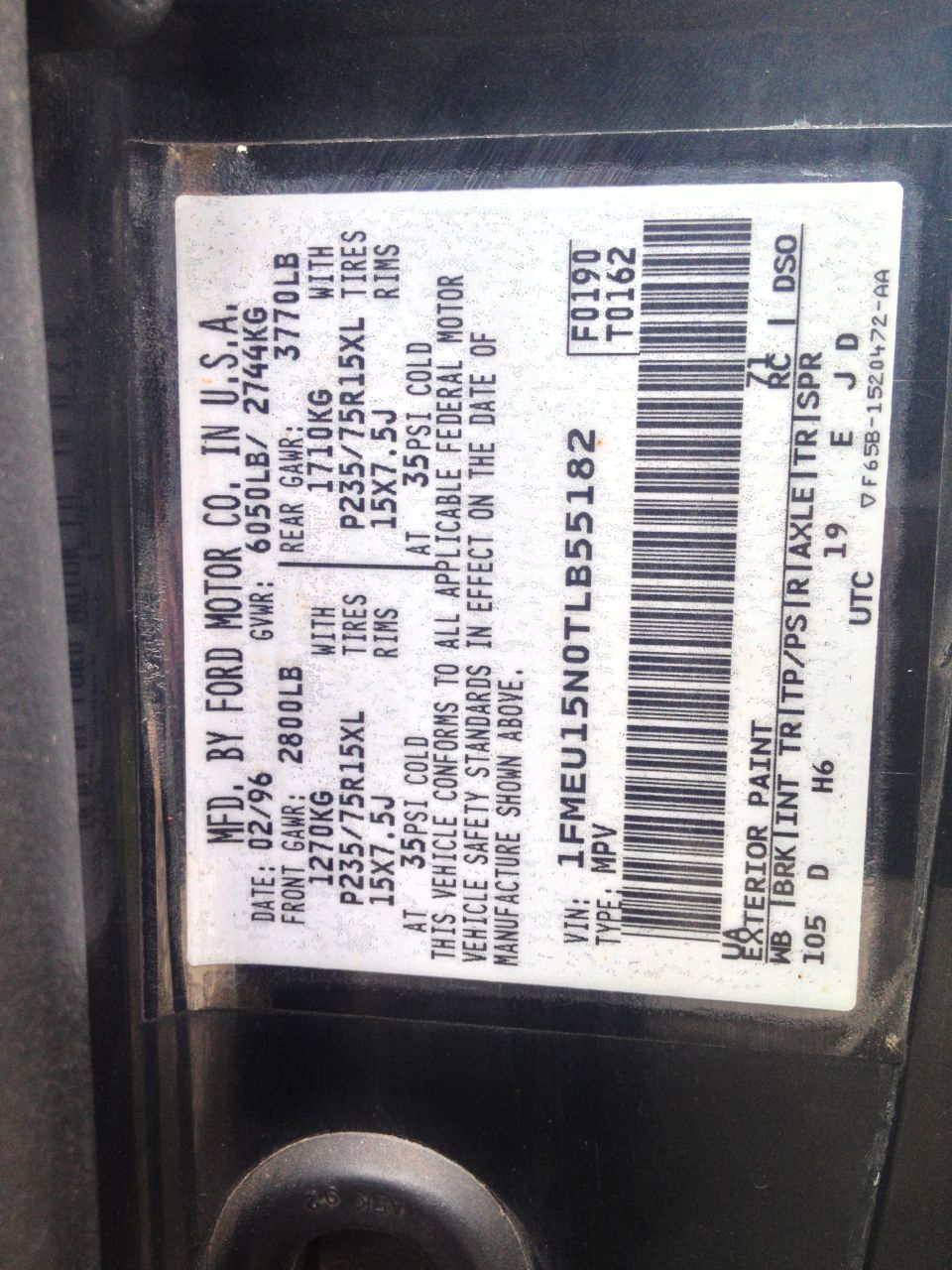 Ford safety certification label dated 02/96 with VIN 1FMEU15N0TLB55182 and P235/75R15XL tire data
