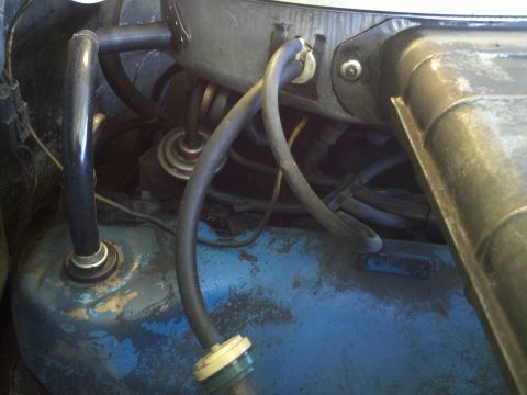 1978 Ford Bronco - Close-up view of engine bay components, including hoses and air cleaner assembly. Supermotors.net logo is present.