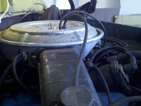 1978 Ford Bronco - Close-up of engine components including air cleaner and distributor, with a Supermotors.net watermark.
