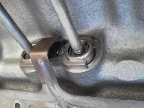 1988 Ford Bronco - Engine valve train components, including pushrods and rocker arm assembly, are visible in this close-up shot.
