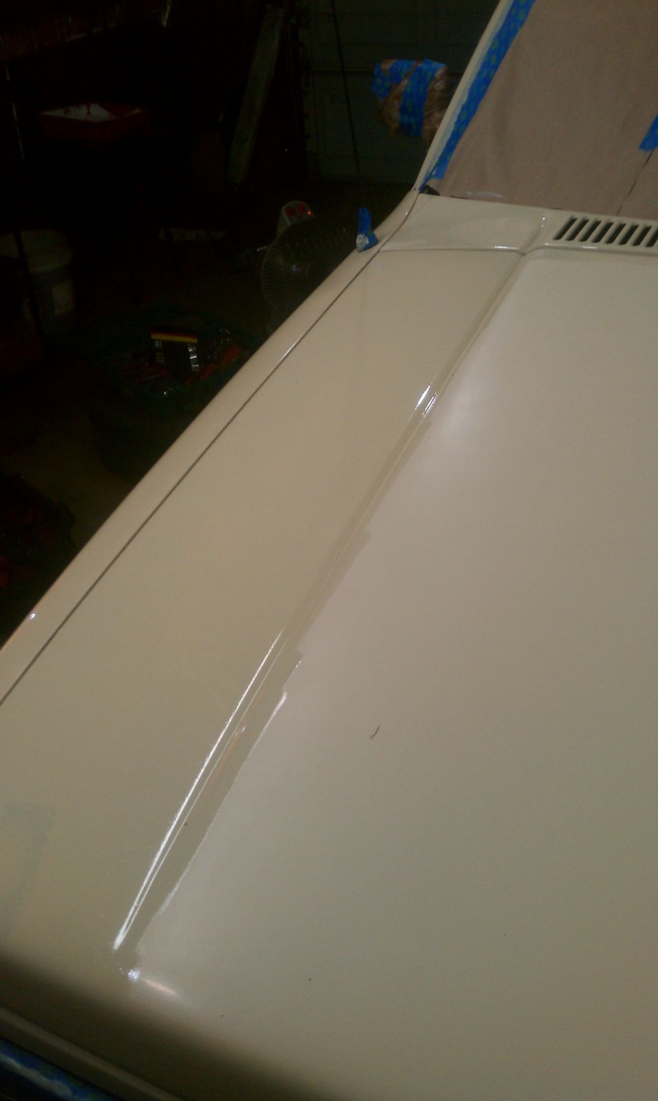 Cream 1991 Chevrolet S10 hood with body line detail