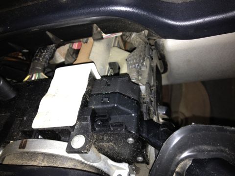 2005 Jeep Wrangler - Close-up of a vehicle's interior electrical components, likely a flasher relay assembly.