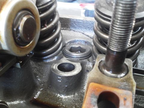 1988 Ford Bronco - Engine internal components including valve springs and rocker arm assembly are visible in this close-up shot.