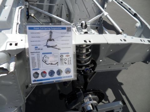 1973 Ford Ranchero - A display board shows a diagram and application list for a front coil-spring suspension system.
