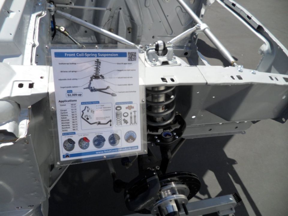 Front coil-spring suspension diagram and part on display
