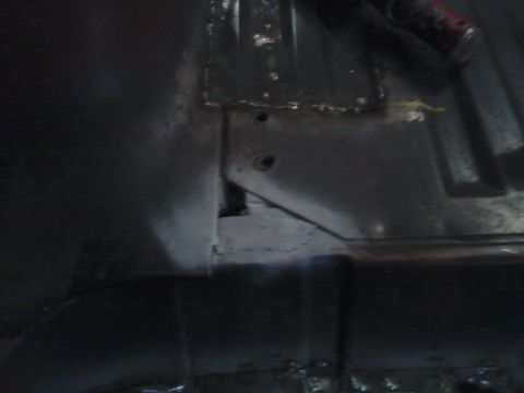 1978 Ford Bronco - Undercarriage view shows structural components and some surface rust.