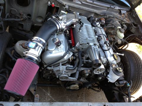 2004 Ford Crown Victoria - Custom supercharged V8 engine assembly with aftermarket air intake system.