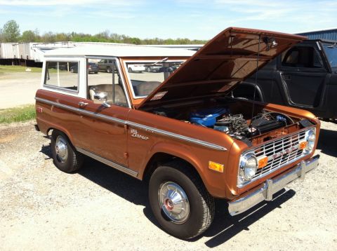 1990 Ford Bronco - This classic Ford Bronco has its hood open, revealing the engine bay.