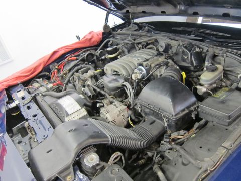 1991 Ford LTD Crown Victoria - Engine bay of a Ford Crown Victoria, showing the V8 engine and associated components.