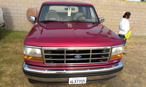 1994 Ford Bronco - This 1994 Ford Bronco is presented in a front-facing view, its distinctive grille and California license plate.