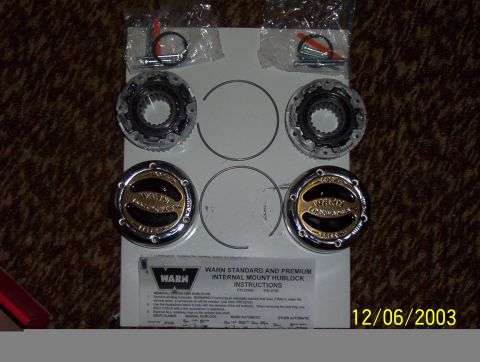 1987 Ford Bronco - This photo shows a set of Warn hublocks and their installation instructions, not a 1987 Ford Bronco.