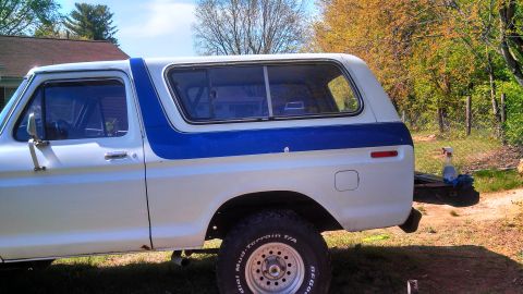 1979 Ford Bronco - This 1979 Ford Bronco features a distinctive white and blue two-tone paint scheme.