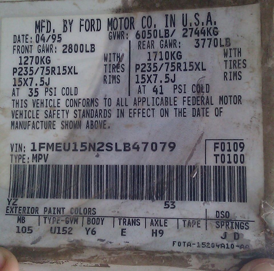 April 1995 Ford certification label with GVWR 6050LB, P235/75R15XL tires and VIN 1FMEU15N2SLB47079