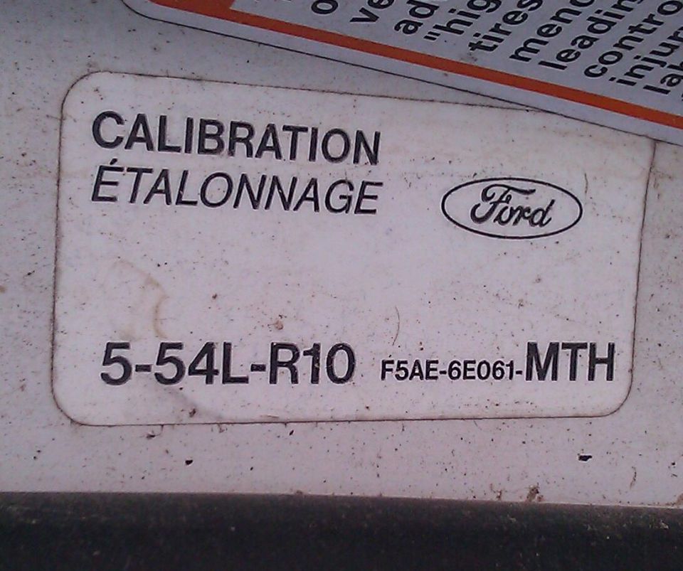 Ford calibration sticker with part number 5-54L-R10 F5AE-6E061-MTH