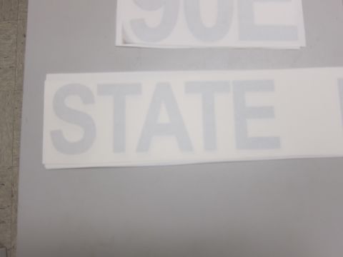 1991 Ford LTD Crown Victoria - Decal with the word STATE visible, likely for a vehicle.