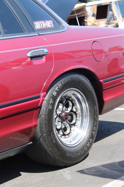 1992 Ford Crown Victoria - Rear view of a 1992 Ford Crown Victoria showing its drag racing tire and wheel setup.