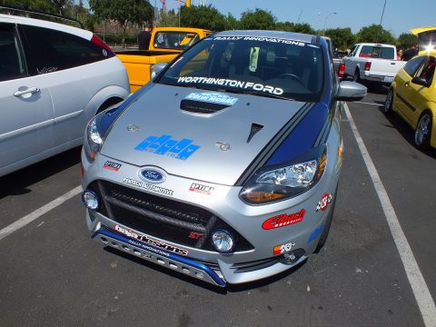 2003 Ford Crown Victoria - Head-on front view of a silver Ford Focus ST rally hatchback with Worthington Ford and Eibach decals and a tubular front bumper guard.