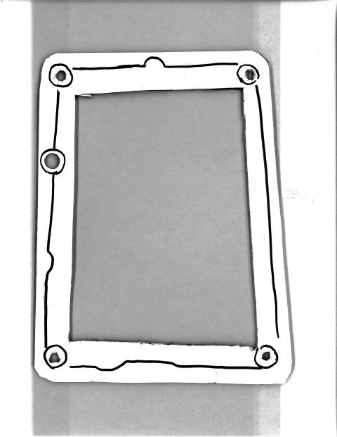 1991 Ford Festiva - A gasket with four bolt holes is shown against a plain background.
