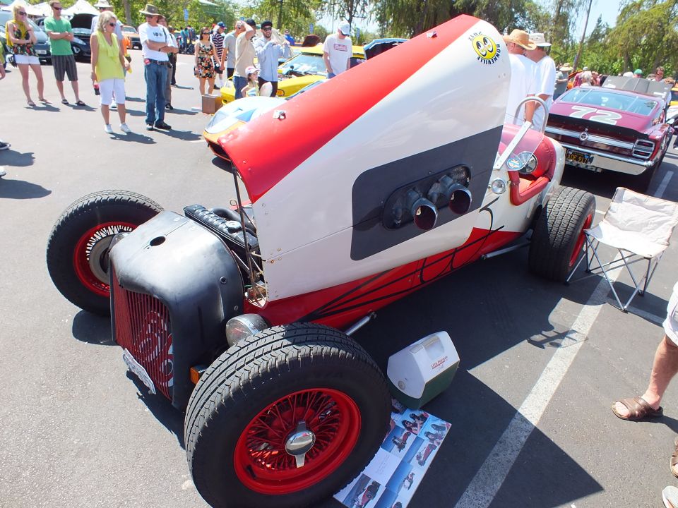 Red and silver streamliner-style vintage racer at car show