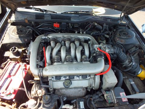 Ford SHO 24 Valve DOHC V6 engine with red coolant line