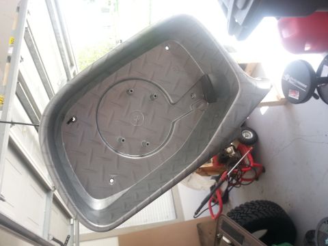 1994 Ford Bronco - A plastic garden cart is shown from an unusual angle, revealing its textured interior.