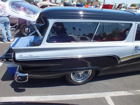 Black and silver 1950s Ranch Wagon with chrome trim, side view