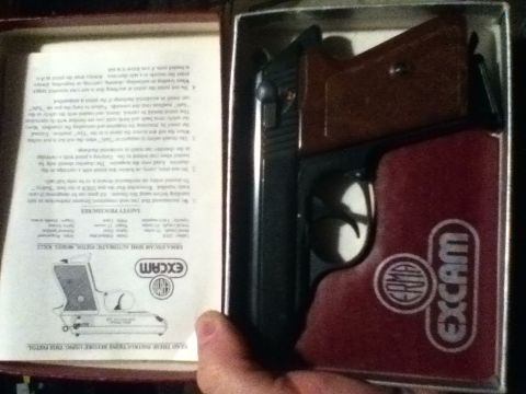 2006 Ford E350 - EXCAM pistol in box with manual detailing safety procedures and a diagram of the firearm.
