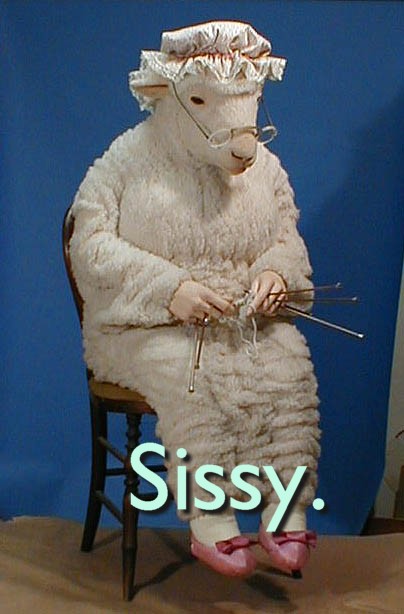 1991 Ford LTD Crown Victoria - A costumed sheep sits knitting while wearing a bonnet, glasses, and pink slippers.