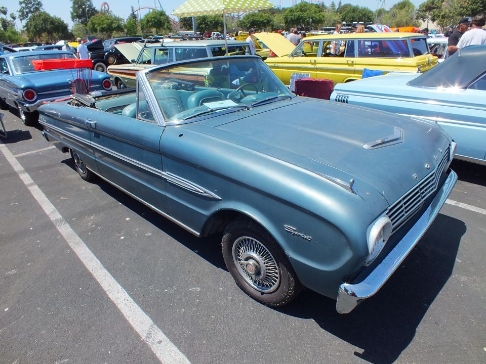 Faded blue Ford Falcon Sprint convertible with wire wheels, front three-quarter