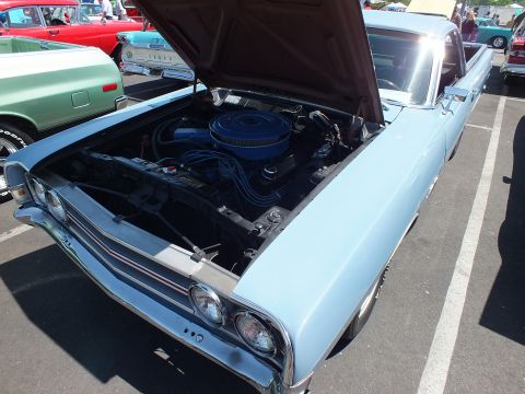 Light blue car-based pickup hood up with blue air cleaner on V8