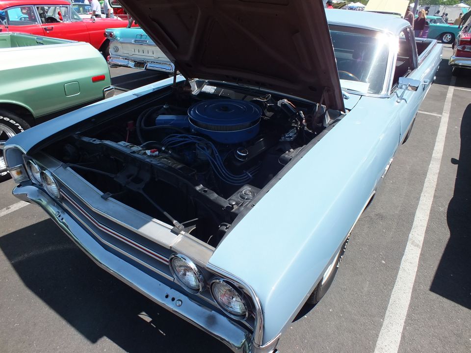 Light blue car-based pickup hood up with blue air cleaner on V8