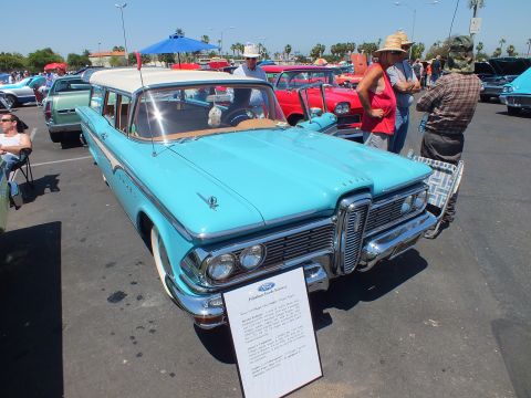 Turquoise and white Edsel station wagon at an outdoor car show