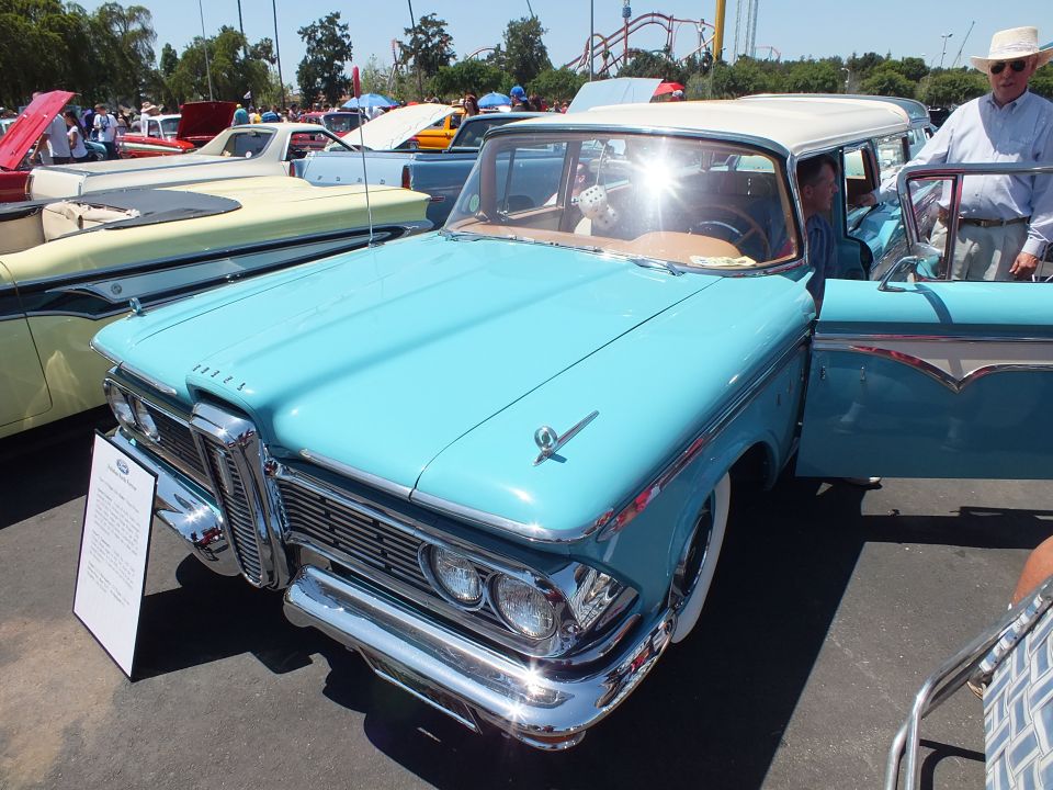 Turquoise and white Edsel sedan with Edsel hood lettering at a car show