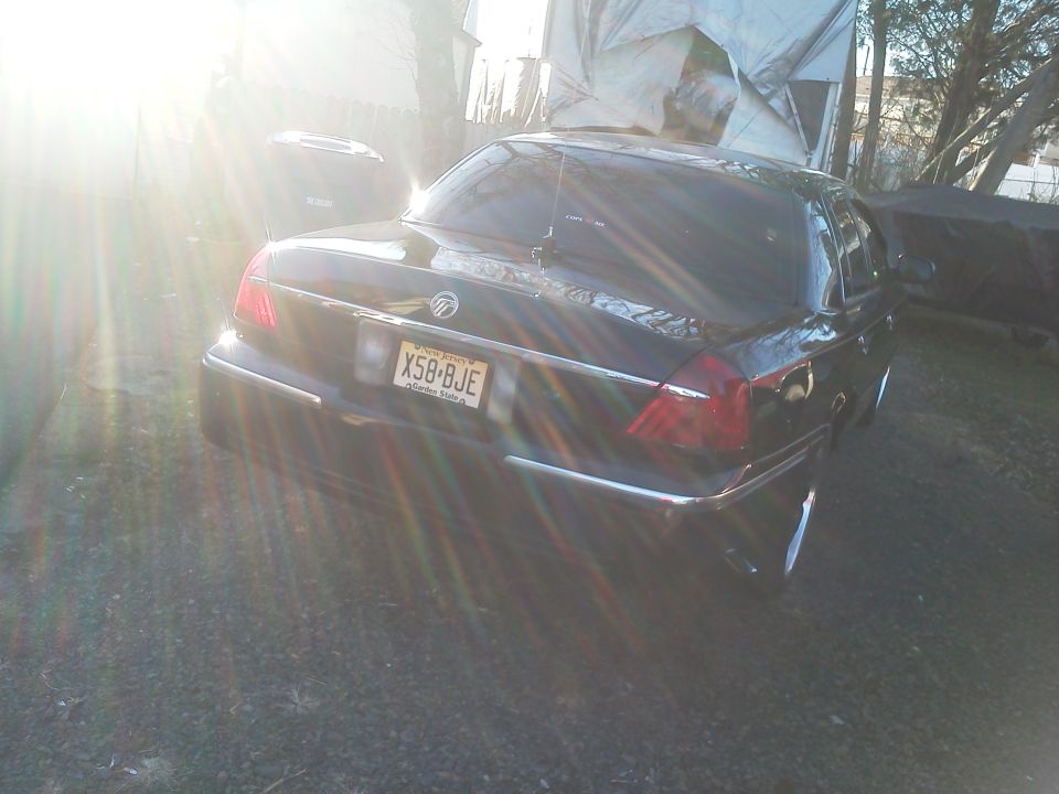 Black 2000 Mercury Grand Marquis rear view with license plate X58-BJE