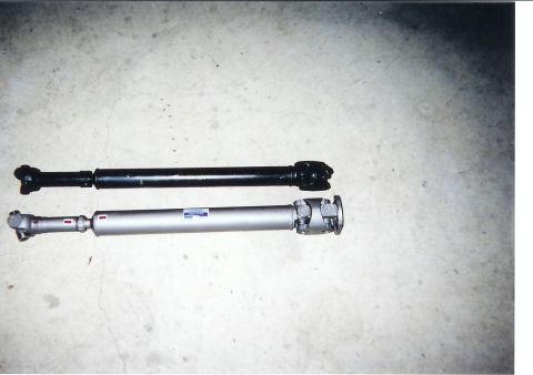 1978 Ford Bronco - Here's the dirrerence between the stock shaft and the High Angle Driveline's shaft.