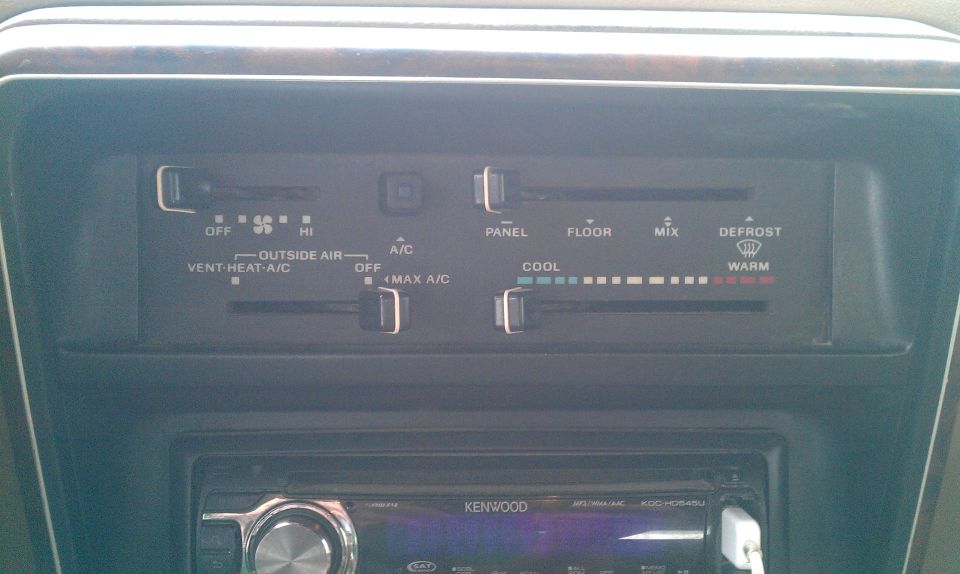 Dashboard climate controls with fan speed, temperature, and vent settings