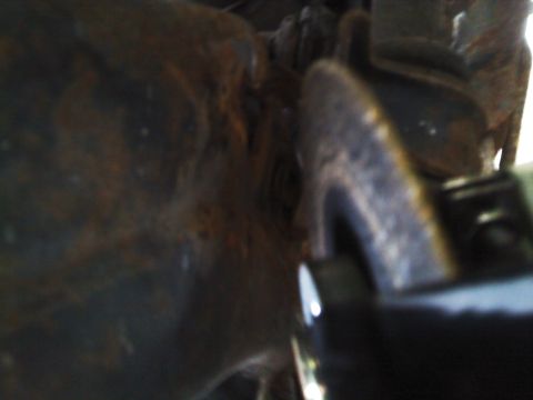 1999 Mercury Grand Marquis - Close-up view of swaybar bushings, with "SUPERMOTORS" watermark visible.