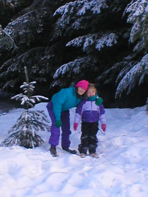 1978 Ford Bronco - Two children pose for a photo in a snowy forest during winter.