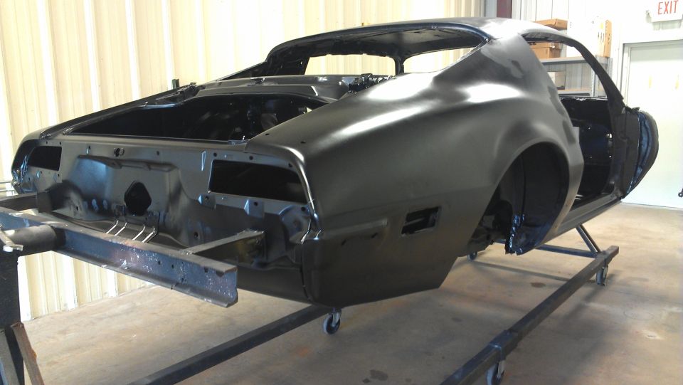 Rear three-quarter view of 1972 Pontiac Trans Am body in black primer