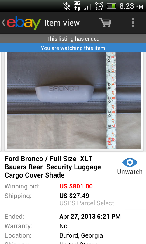 1994 Ford Bronco - A Ford Bronco cargo cover part is shown with a ruler indicating its dimensions.