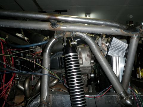 1961 International Scout 800 - Custom roll cage and engine components are visible in this engine bay.