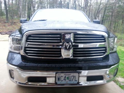 2007 Dodge Durango - Front view of a black Dodge Ram truck with a chrome grille and a Missouri license plate.