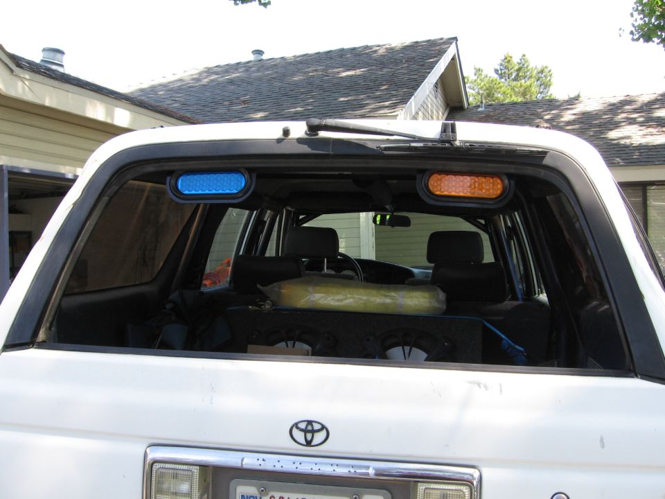 1993 Toyota 4Runner rear view with blue and orange lights mounted inside the rear window