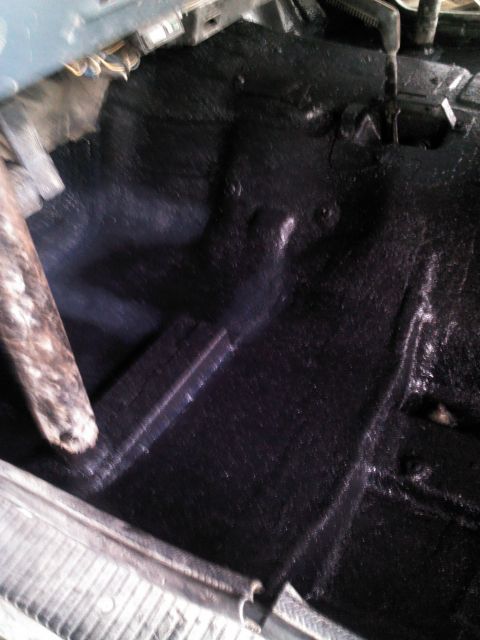 1987 Jeep Comanche - Vehicle interior floor pan appears to have been recently painted black.