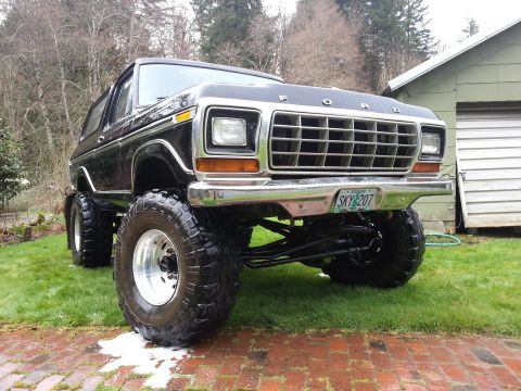 1979 Ford Bronco - Front view of a modified 1978 Ford Bronco with custom suspension and off-road tires.