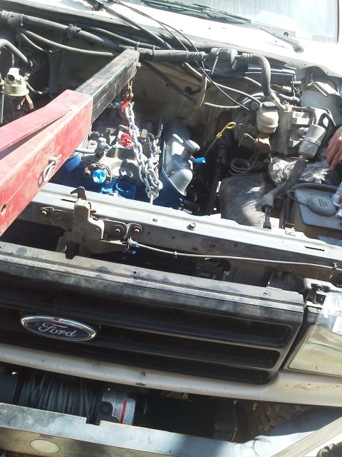 1988 Ford Bronco - Engine removal in progress on a 1988 Ford Bronco.