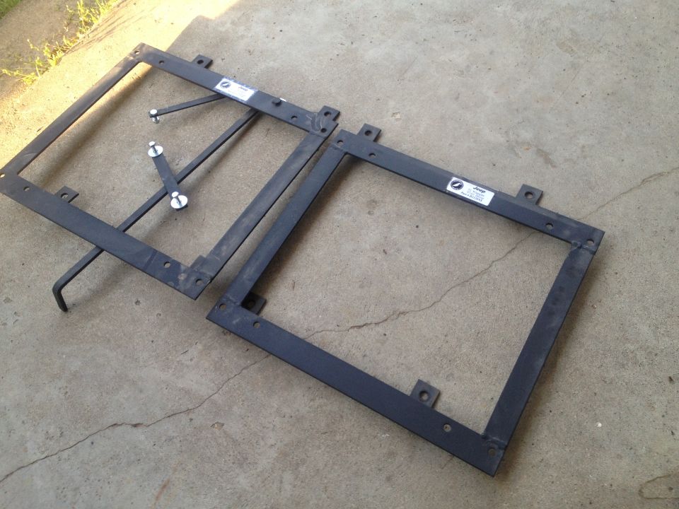 Pair of black metal seat brackets with visible "Jeep" labels