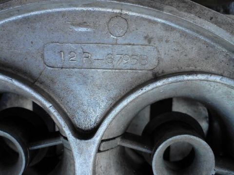 1995 Ford Bronco - Carburetor part number 12R-8795B visible on metal casting.